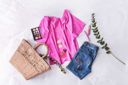 Stylish female look with jeans clothes on white backgroundの写真素材