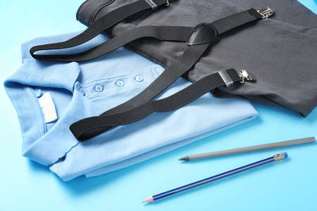 Stylish school uniform on color backgroundの写真素材