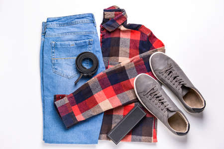 Stylish male look with jeans clothes on white backgroundの写真素材