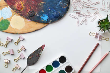 Composition with artist supplies on white backgroundの写真素材