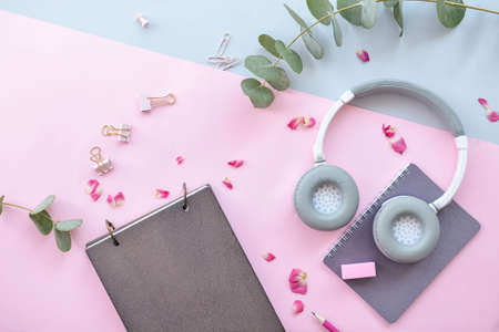 Composition with stationery and headphones on color backgroundの写真素材