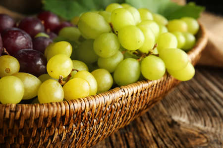 Ripe sweet grapes in bowl, closeupの写真素材