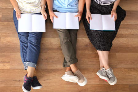 Students reading books while preparing for exam, top viewの写真素材