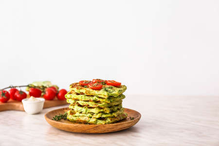 Tasty squash waffles on light tableの写真素材