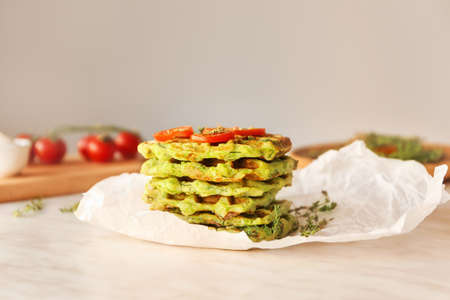Tasty squash waffles on light table