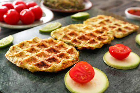 Tasty squash waffles on board closeupの写真素材
