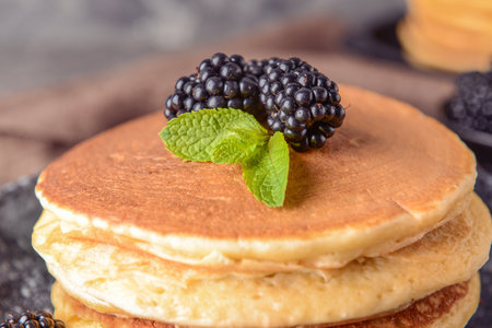Stack of tasty pancakes with blackberry, closeupの写真素材