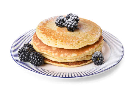 Tasty pancakes with blackberry on white background