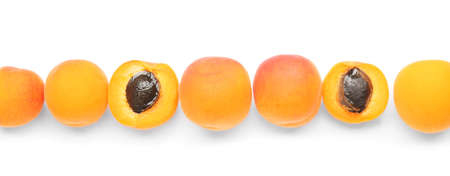 Tasty ripe apricots on white backgroundの写真素材