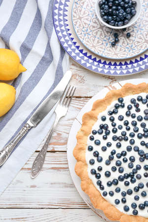 Composition with tasty bilberry pie on tableの写真素材