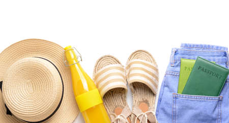 Composition with beach accessories on white background