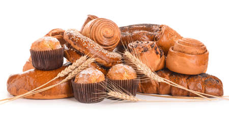 Heap of tasty pastries on white background