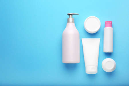 Set of cosmetic products on color background