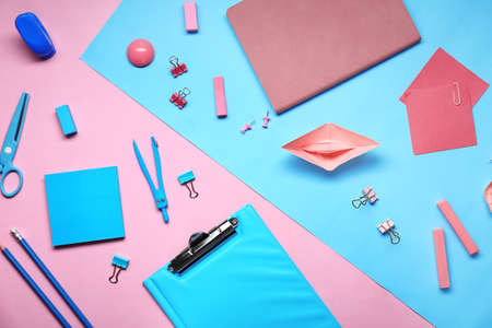Set of school supplies on color background