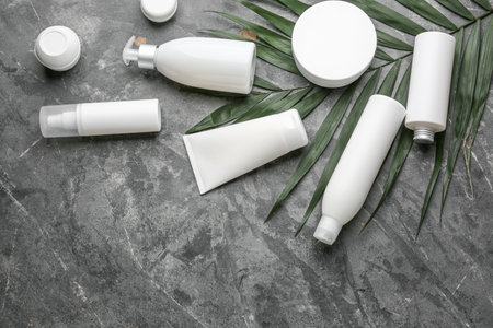 Set of cosmetic products on grunge background