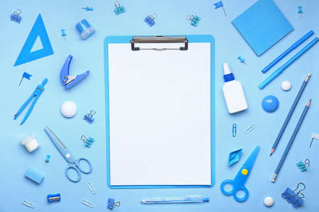 Set of school supplies with clipboard on color backgroundの写真素材