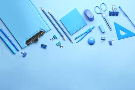 Set of school supplies on color backgroundの写真素材