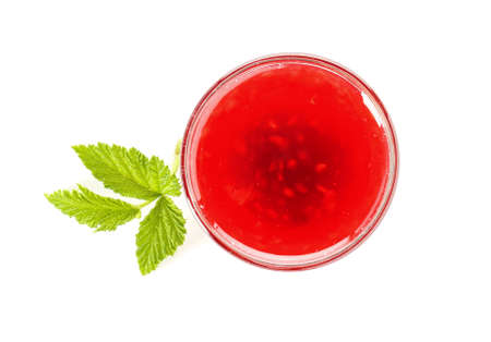 Bowl of tasty raspberry jam on white background