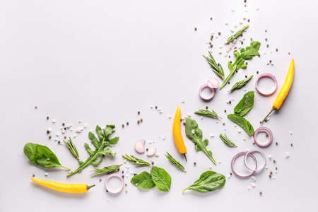 Fresh herbs with vegetables and spices on white backgroundの写真素材