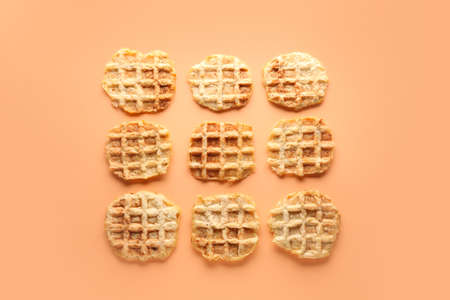 Tasty waffles on color backgroundの写真素材