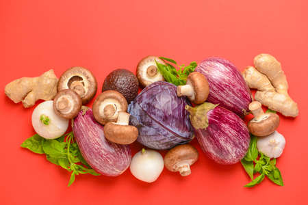 Assortment of fresh vegetables on color background