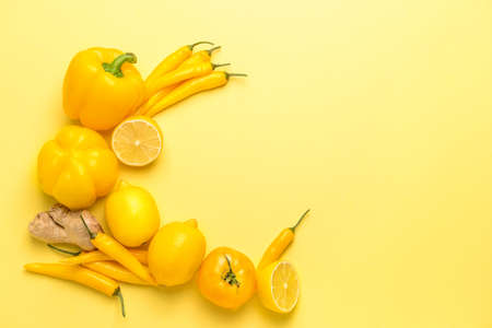 Assortment of fresh vegetables on color background