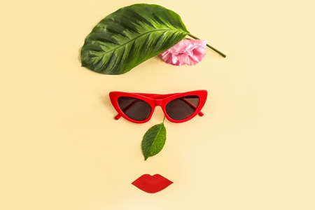 Creative composition with stylish sunglasses on color backgroundの写真素材