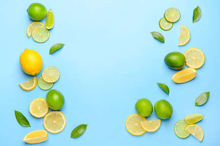 Fresh limes and lemons on color backgroundの写真素材