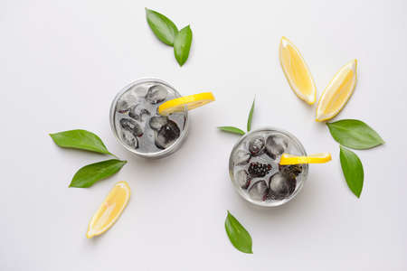 Glasses of fresh infused water on white backgroundの写真素材
