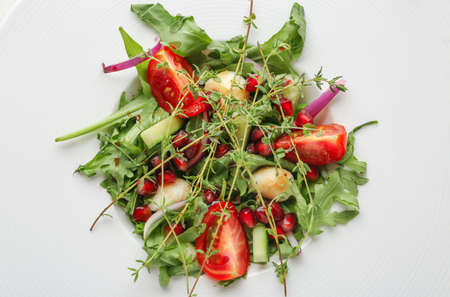 Plate with tasty arugula salad, closeupの写真素材