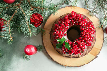 Tasty Christmas pie on light backgroundの写真素材