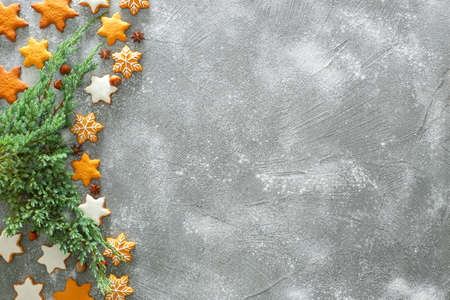 Composition with tasty Christmas cookies on grunge backgroundの写真素材