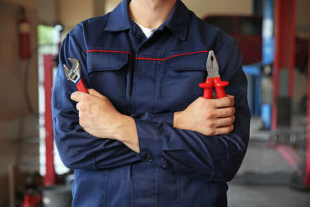 Male mechanic in car service centerの写真素材