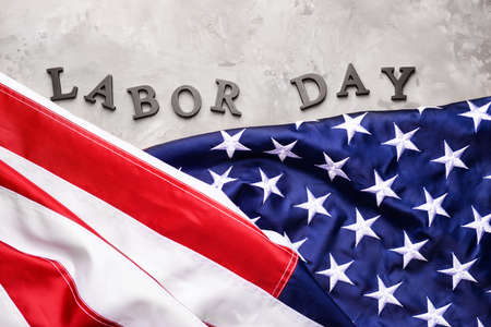 USA flag and text LABOR DAY on gray backgroundの写真素材