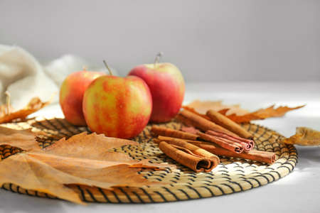 Fresh apple with cinnamon on matの写真素材