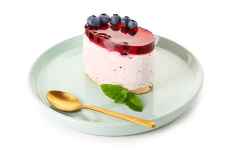 Plate with blueberry dessert on white backgroundの写真素材