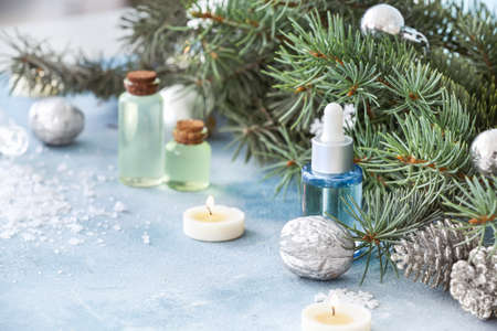 Christmas decor and products for spa treatment on tableの写真素材