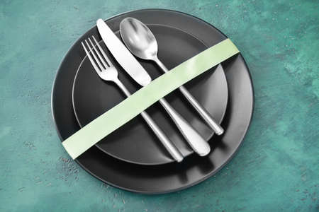 Simple table setting on color background