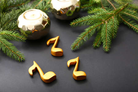 Notes and Christmas decor on dark backgroundの写真素材