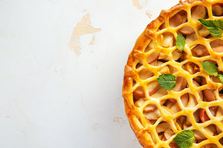 Tasty apple pie on light tableの写真素材