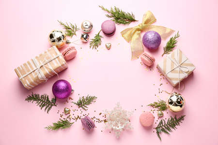 Beautiful composition with Christmas decor on color backgroundの写真素材