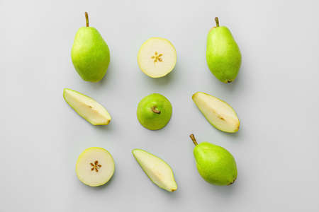 Tasty fresh pears on gray backgroundの写真素材