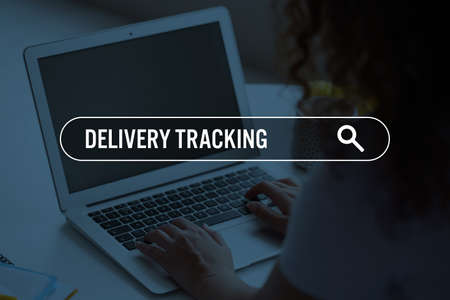 Woman with laptop using delivery service application