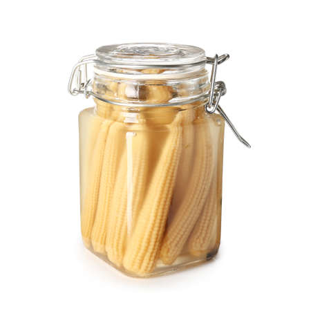 Jar with canned corn cobs on white backgroundの写真素材
