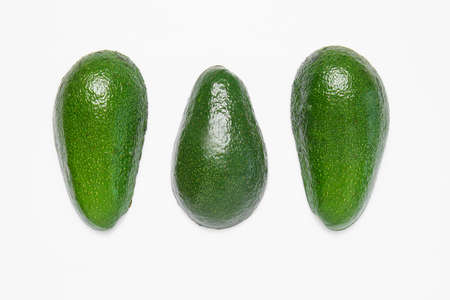 Ripe avocados on white backgroundの写真素材