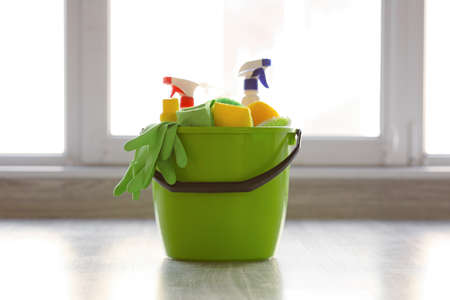 Set of cleaning supplies in room