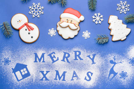 Composition with tasty Christmas cookies on color backgroundの写真素材
