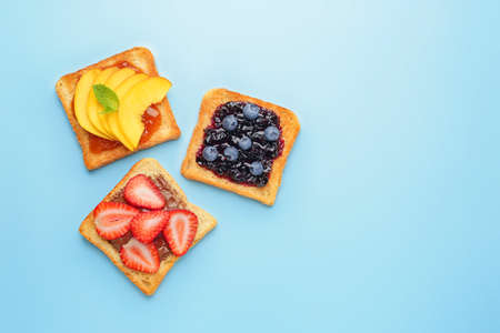 Different tasty sandwiches on color backgroundの写真素材