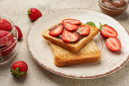 Plate with tasty sandwich on tableの写真素材