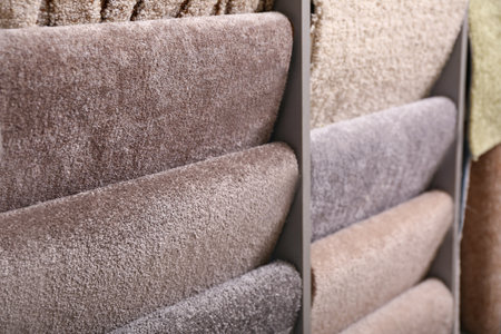 Different samples of carpets in shop, closeupの写真素材